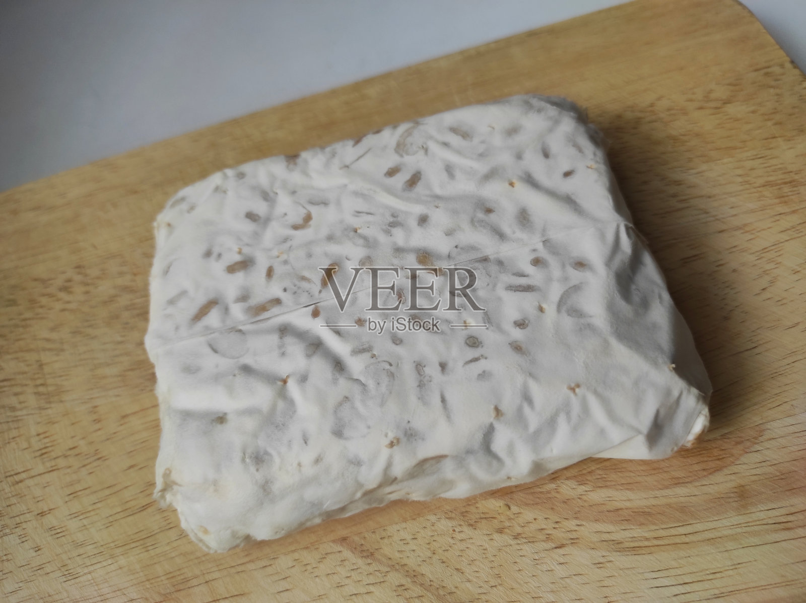 “印尼豆豉:用印尼的生大豆制成的生豆豉照片摄影图片