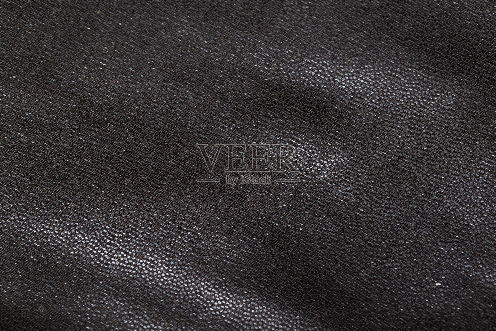 黑色面料，色泽漂亮，微缩。时尚照片摄影图片