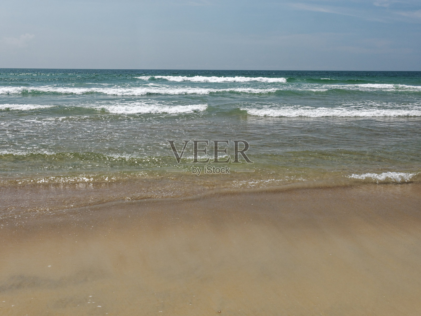 热带波浪水海岸和沙滩的观点照片摄影图片