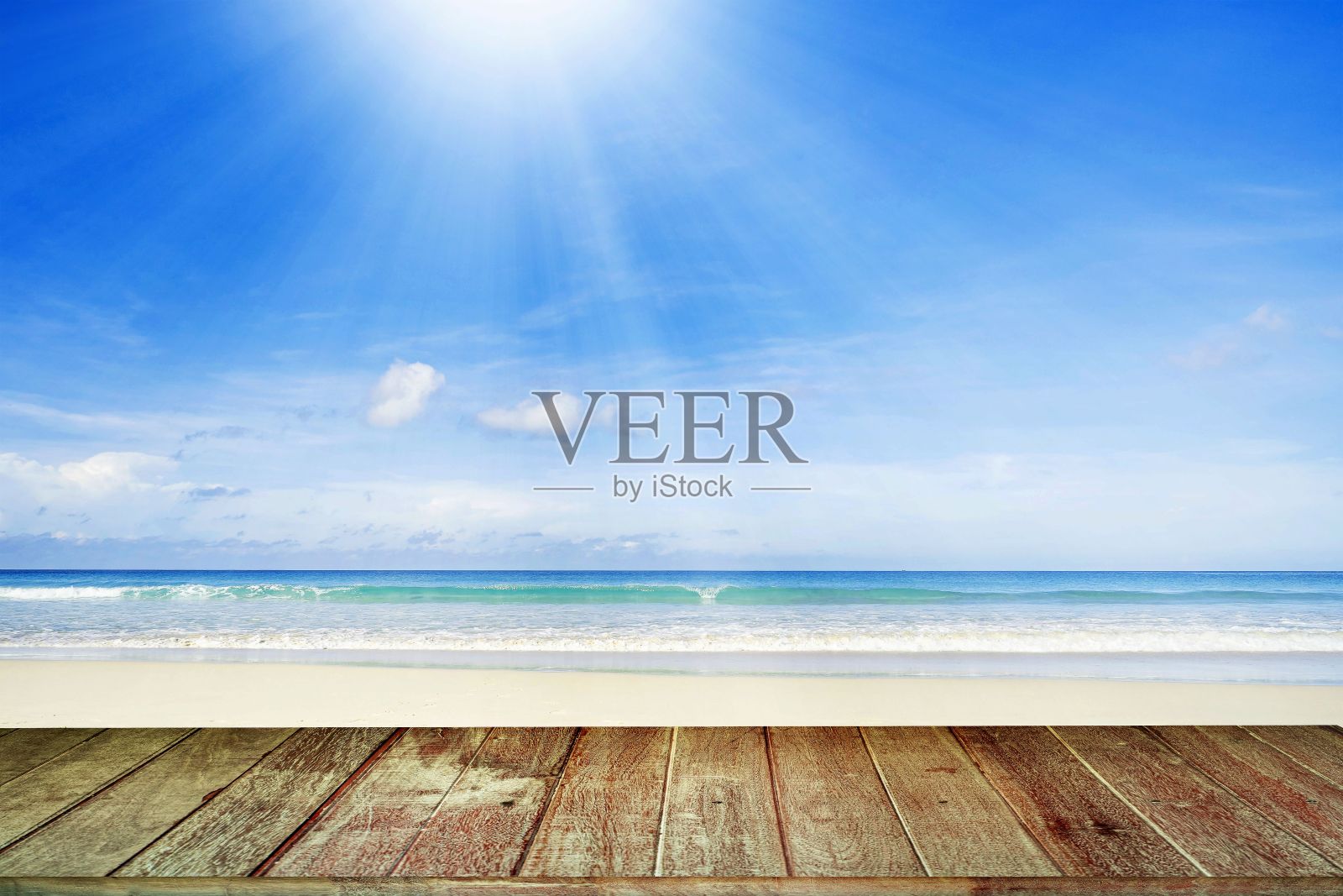 3D渲染：阳光明媚的日子里，从门廊看到的蓝色大海和沙滩照片摄影图片