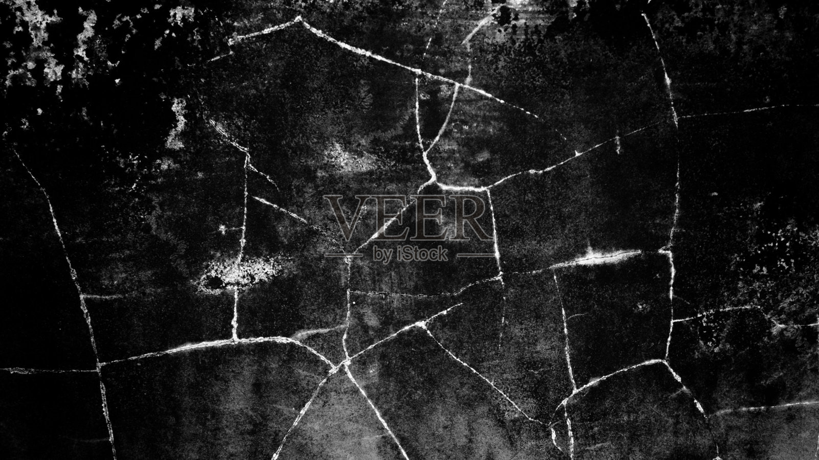 灰色特写的垃圾质感的黑色墙壁。照片摄影图片