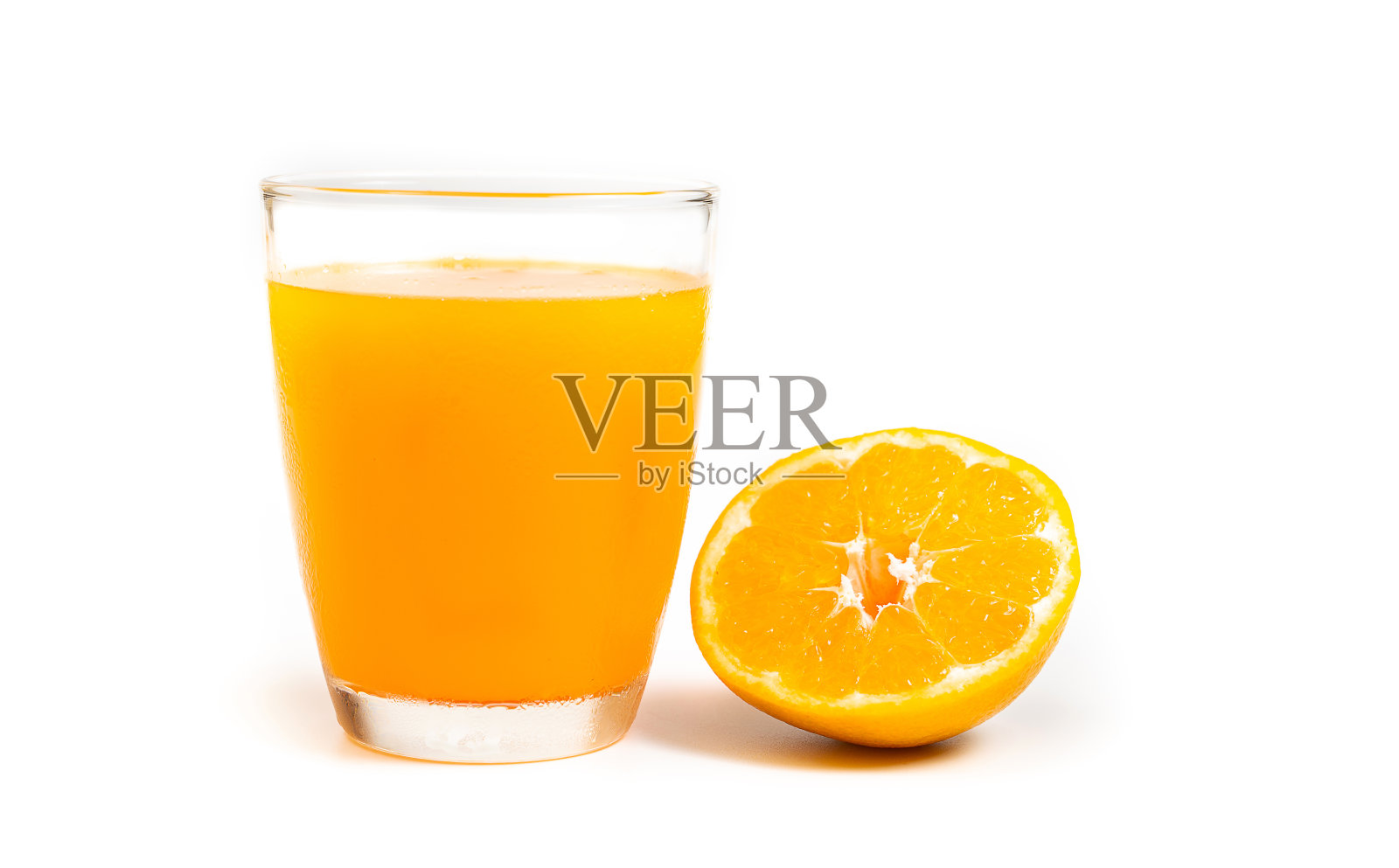 新鲜橙汁在透明的玻璃照片摄影图片
