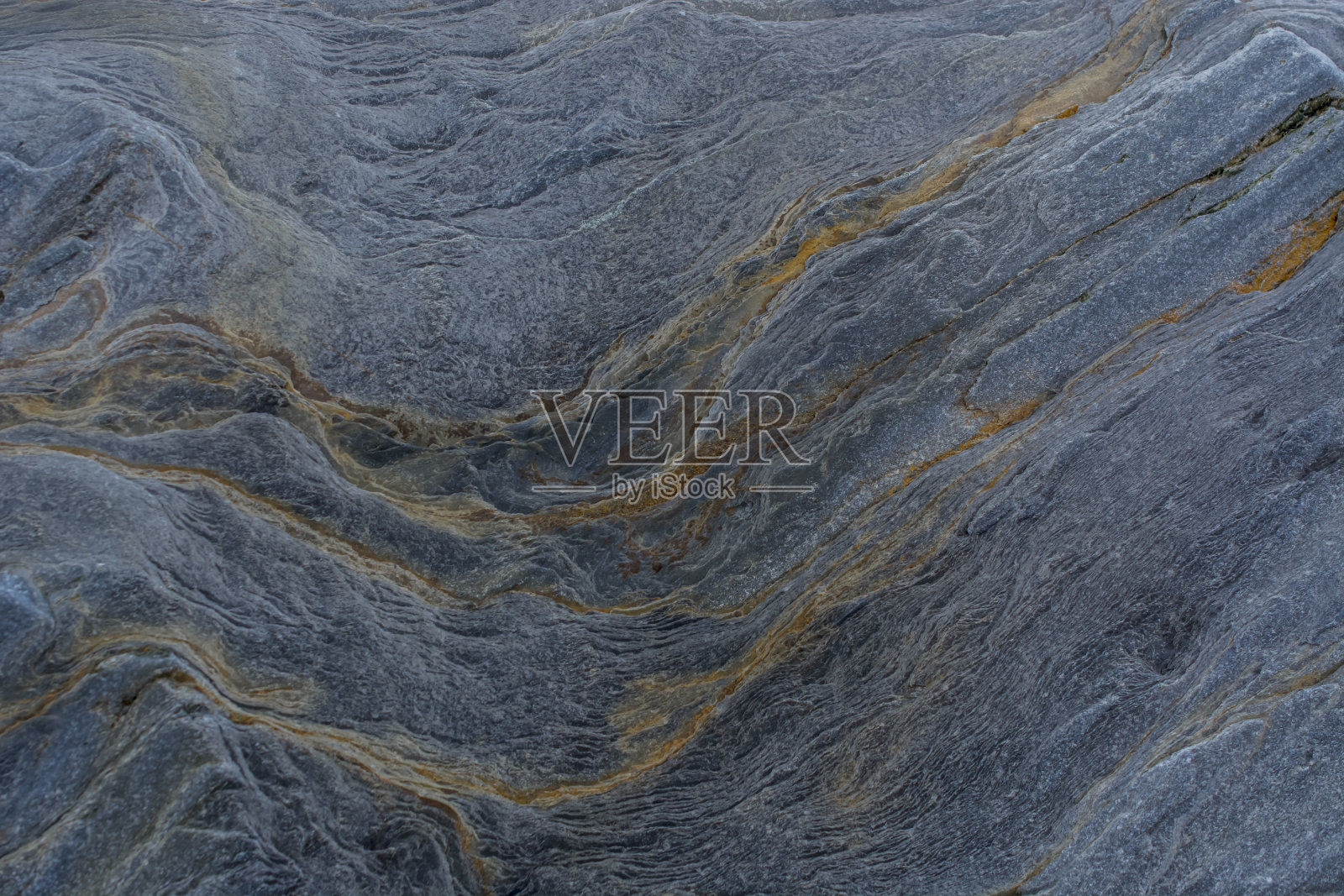 石头抽象的自然背景岩石与奇怪的纹理在海滩上照片摄影图片