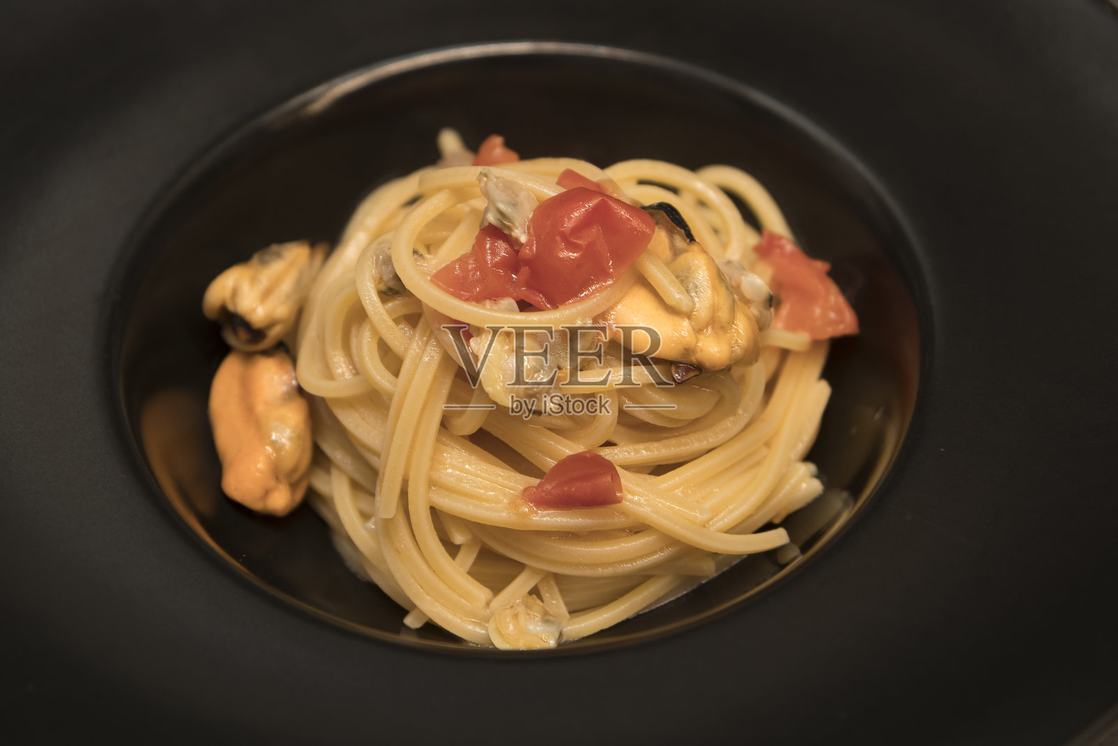 烹饪海鲜意大利面照片摄影图片