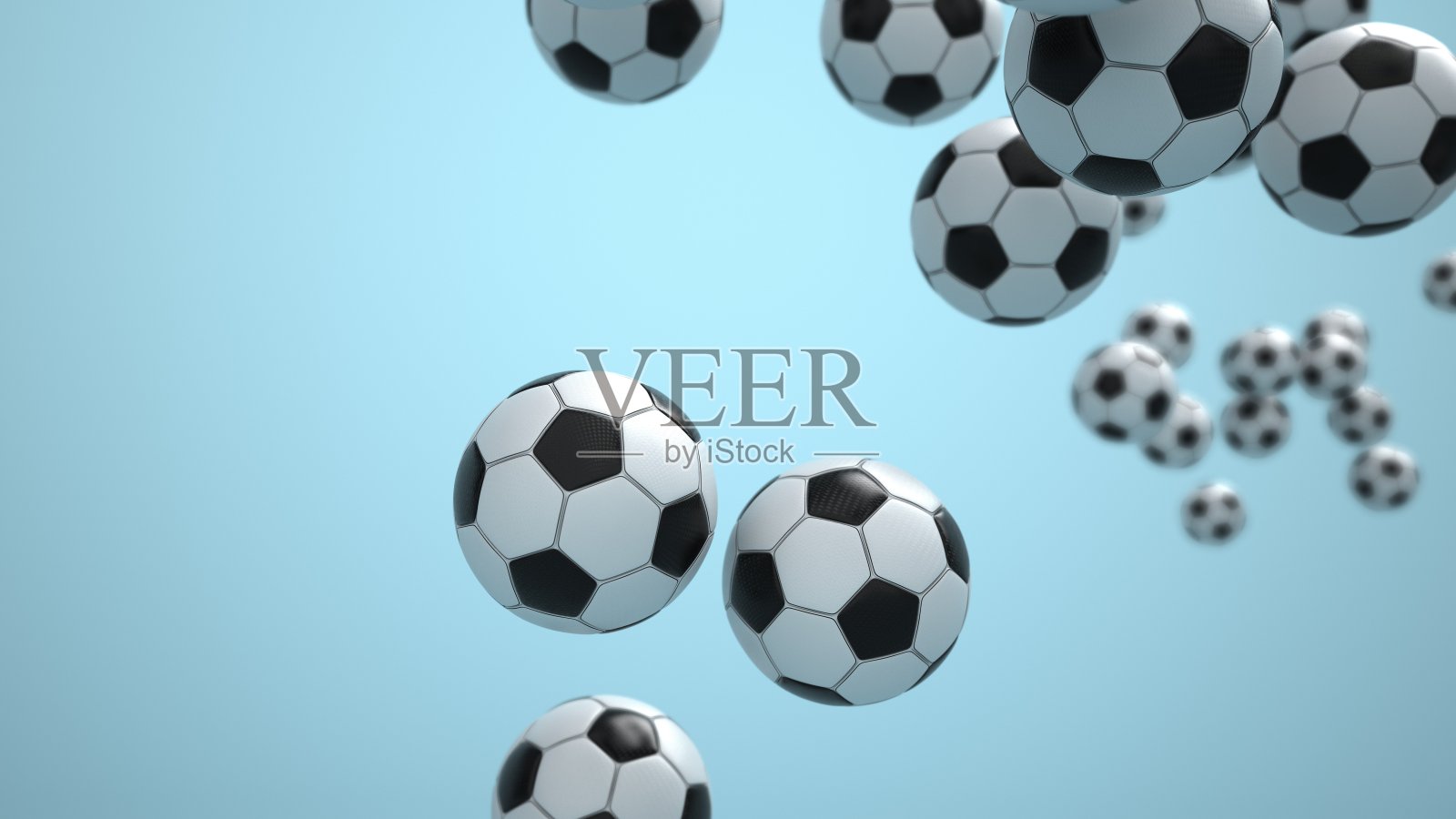 飞行的足球蓝色背景照片摄影图片