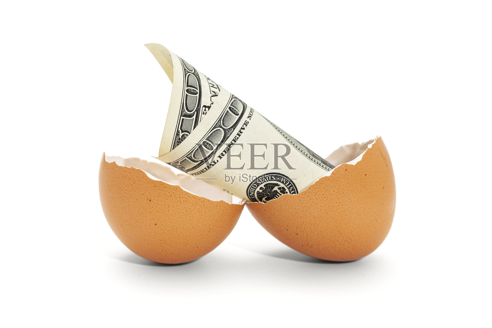 蛋壳与100美元纸币照片摄影图片