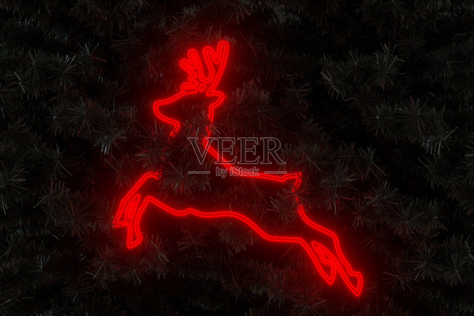 红色霓虹灯圣诞装饰鹿在黑色圣诞树新年背景照片摄影图片