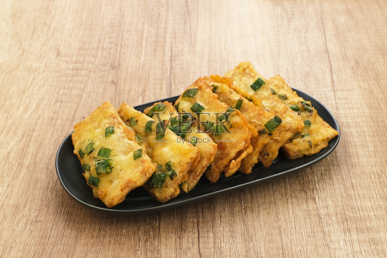 这是传统的油炸豆豉照片摄影图片