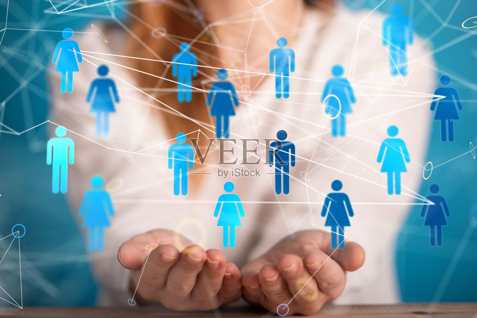 一组3D渲染的人图标盘旋在女人的手上照片摄影图片