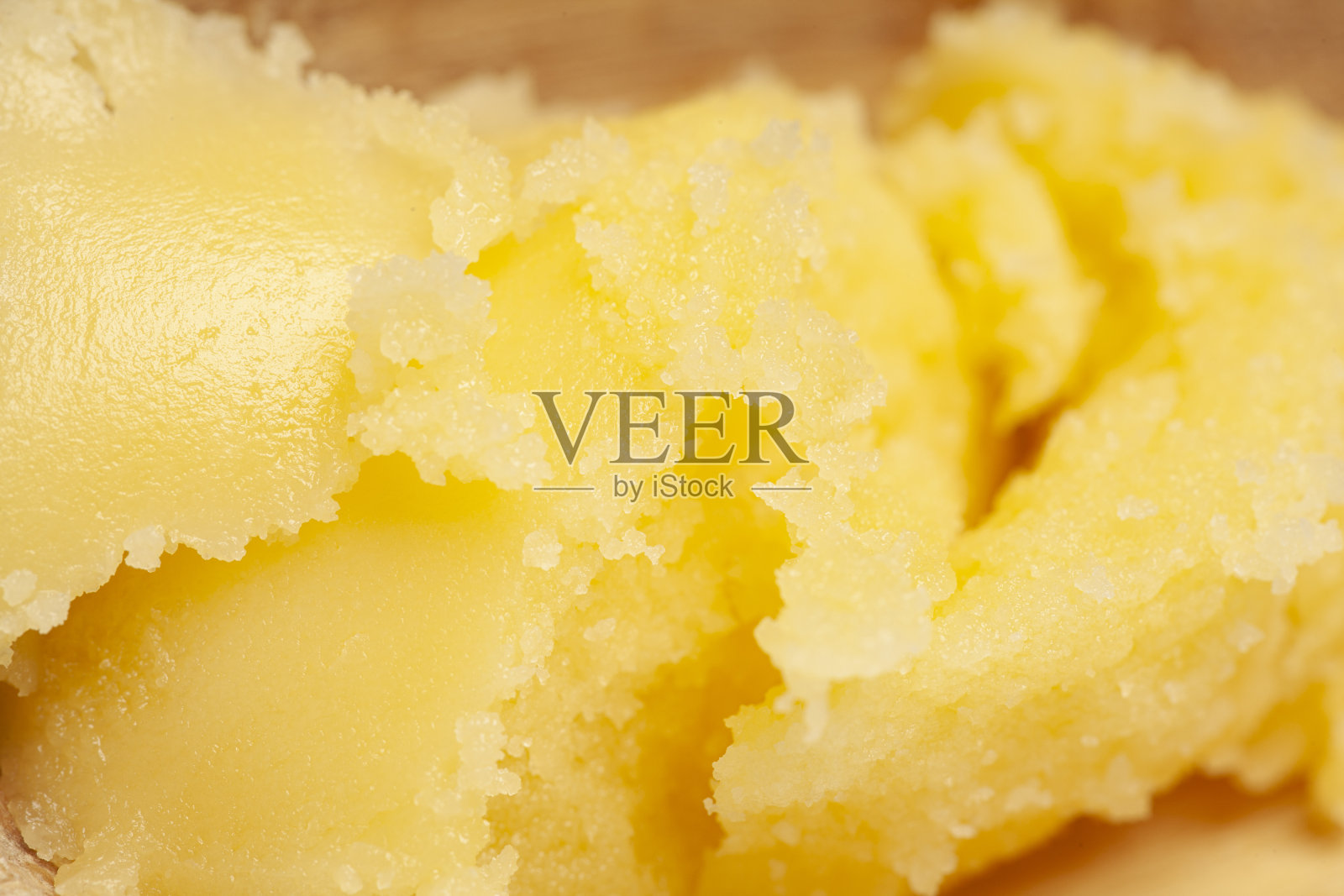 自制的融化酥油澄清黄油接近宏观食物背景照片摄影图片