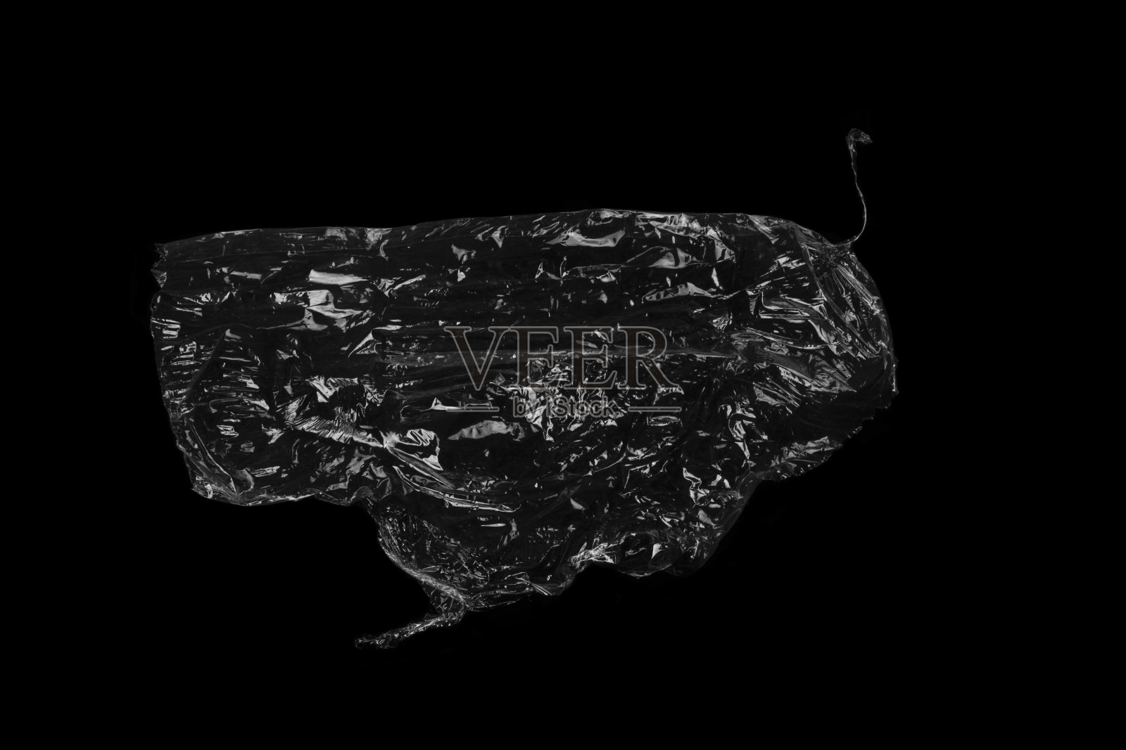 抽象的黑色纹理的褶皱塑料薄膜墙纸和背景照片摄影图片