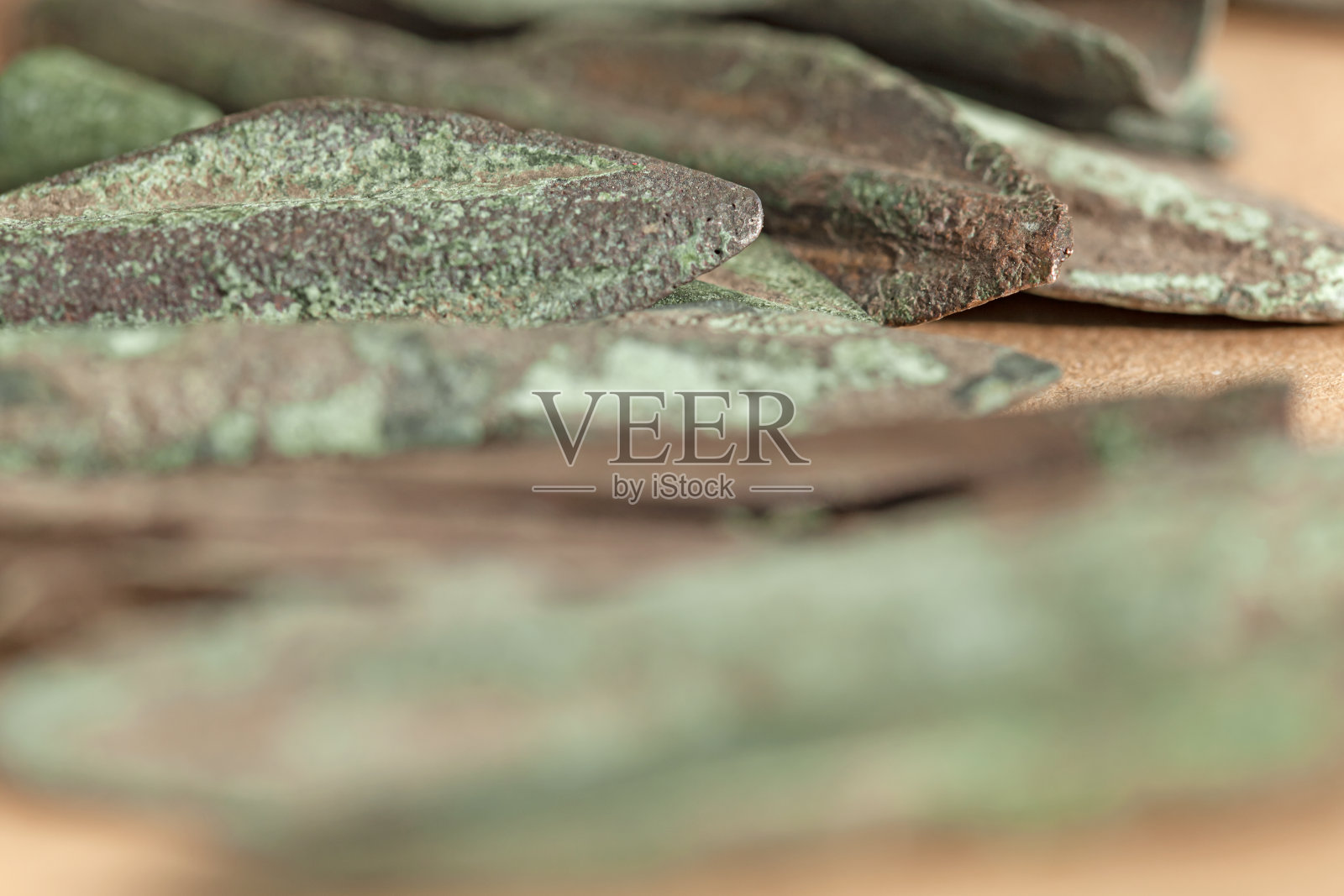 古斯基泰青铜箭头。有选择性的重点。古老的武器照片摄影图片