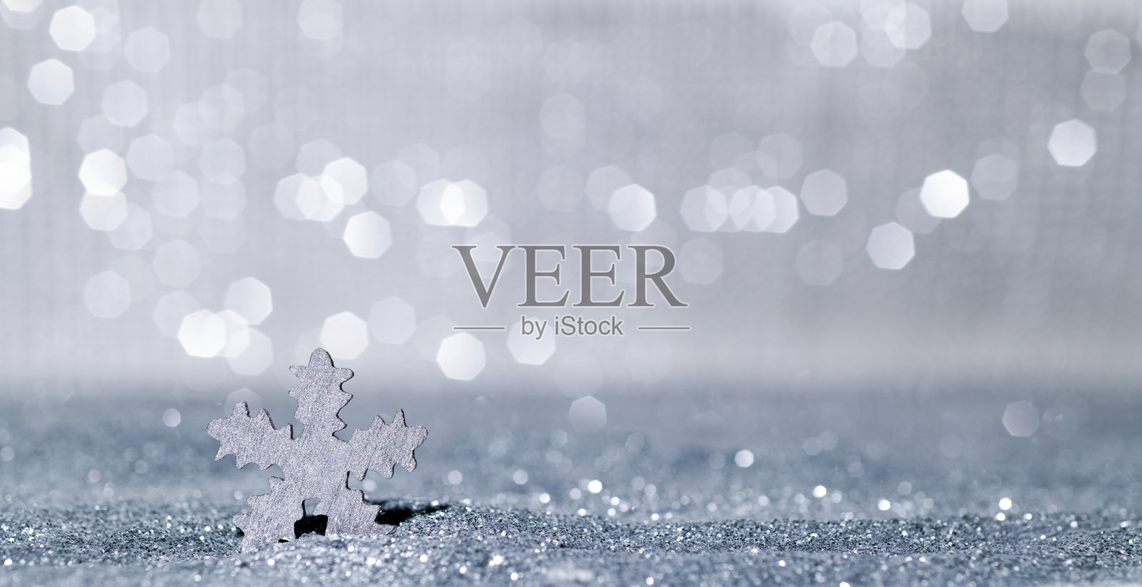 圣诞雪花在闪亮的背景照片摄影图片