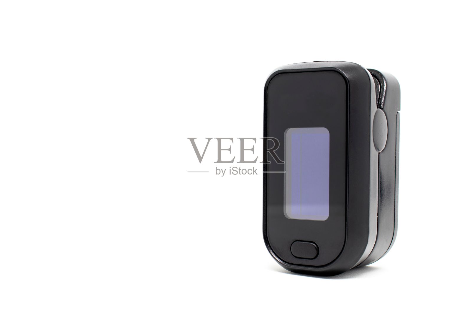 特写镜头的脉搏血氧计测量氧气隔离在一个白色背景照片摄影图片