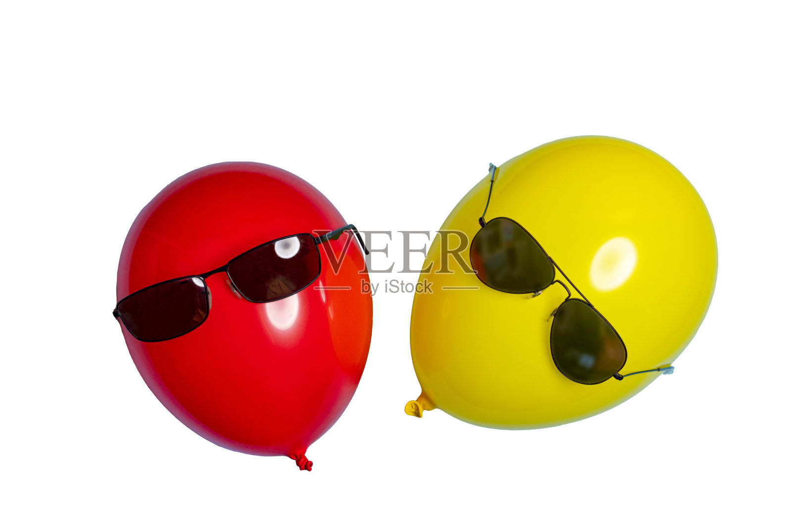 红色和黄色的气球和太阳镜照片摄影图片