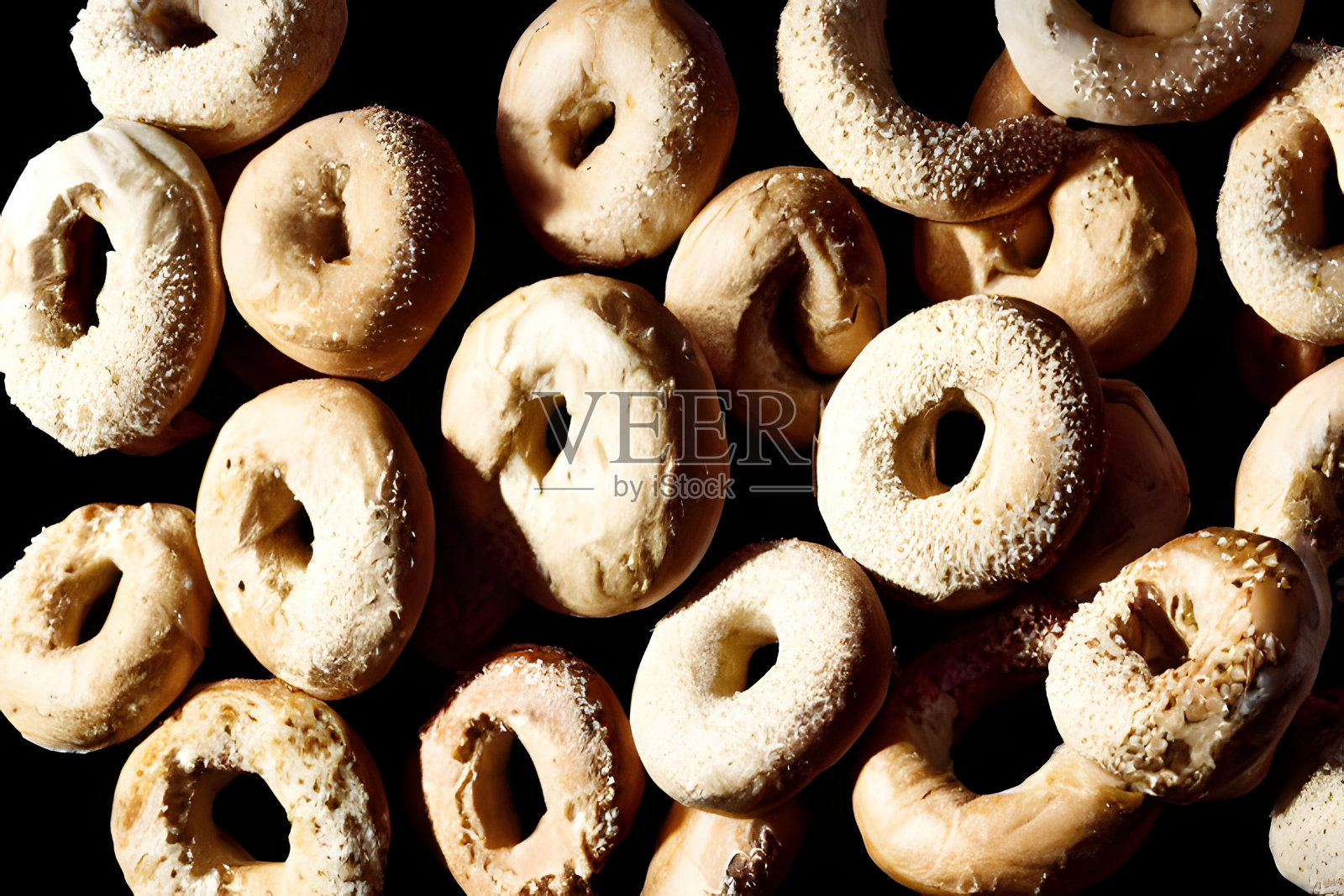 一堆美味的芝麻面包圈的特写镜头照片摄影图片