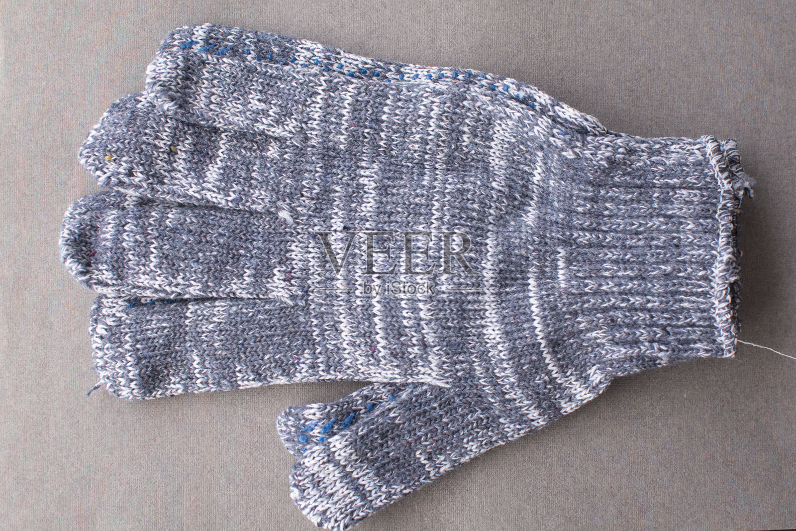 加强针织手套，凝胶PVC涂层。施工手套。照片摄影图片