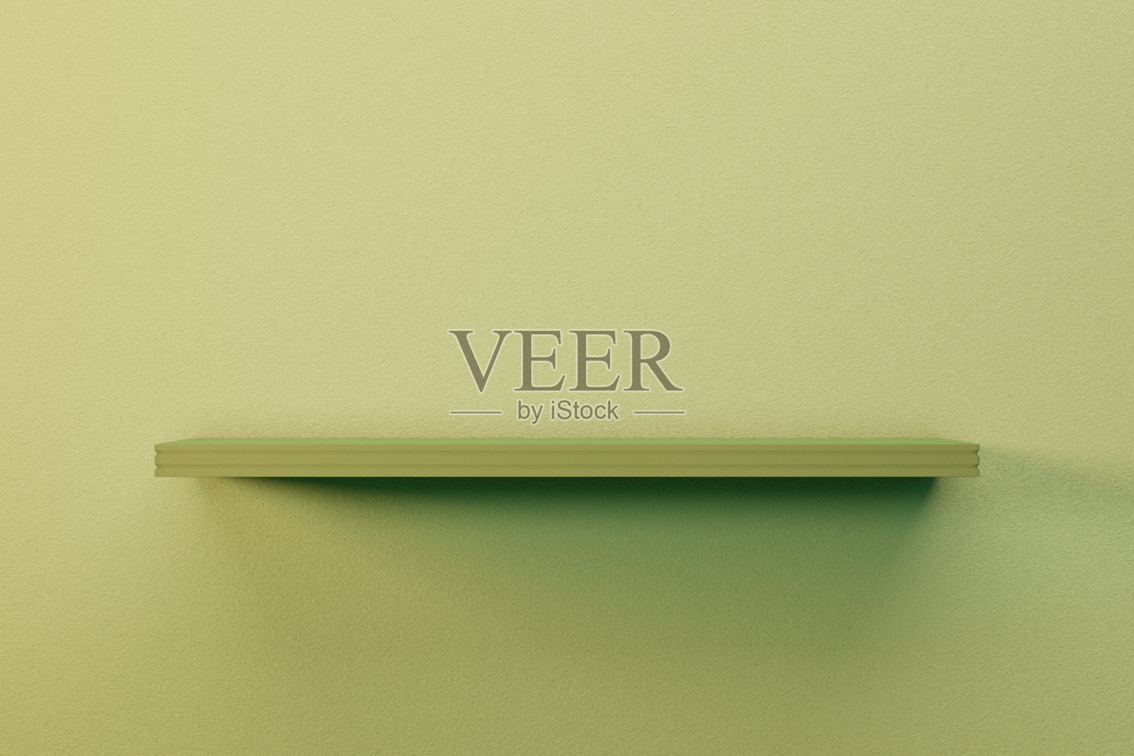 绿色的空架子上的绿色灰泥墙。照片摄影图片