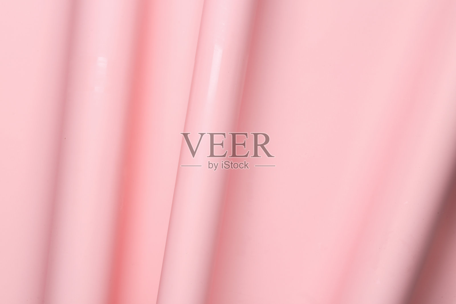 波浪质感的粉彩粉红色乙烯基特写照片摄影图片