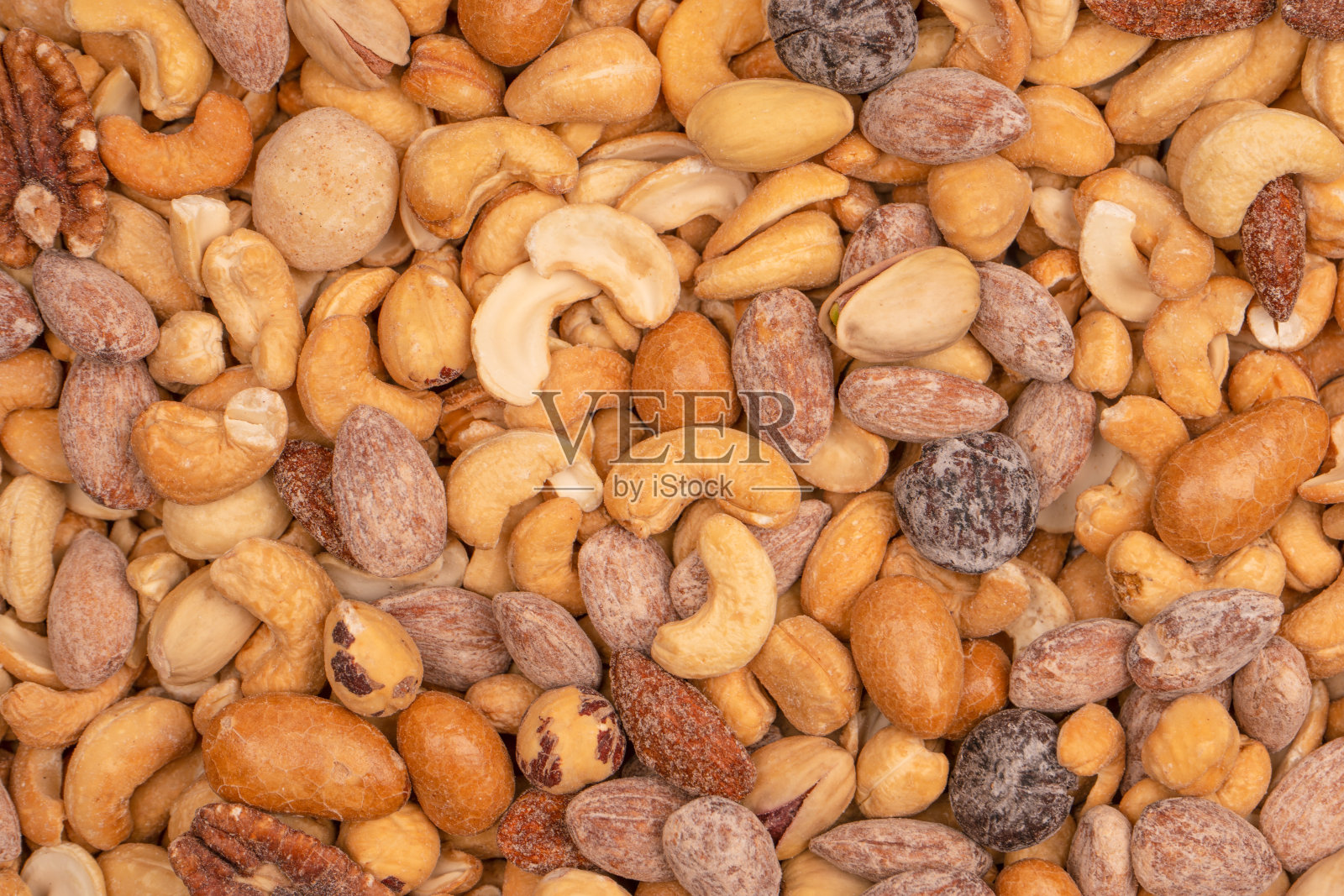 一组杏仁，开心果，核桃，澳洲坚果，腰果。照片摄影图片