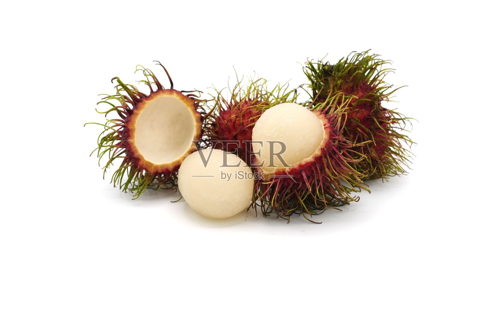 白色背景上隔离的红毛丹水果的特写照片摄影图片