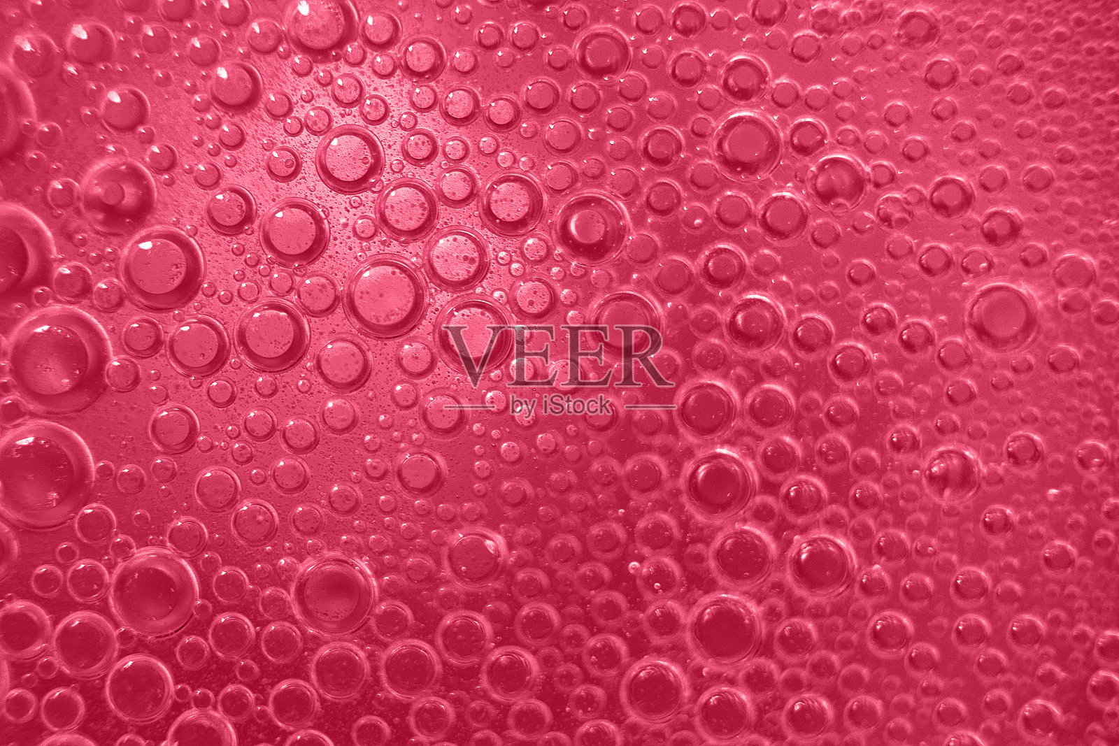 抽象光viva品红色背景与油圈。水泡越来越近照片摄影图片