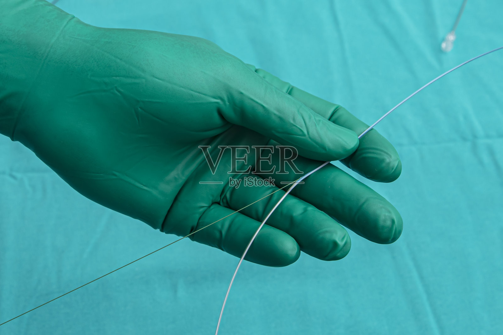 冠状动脉成像导管。双腔导管。冠状动脉造影显示微导管导丝。照片摄影图片