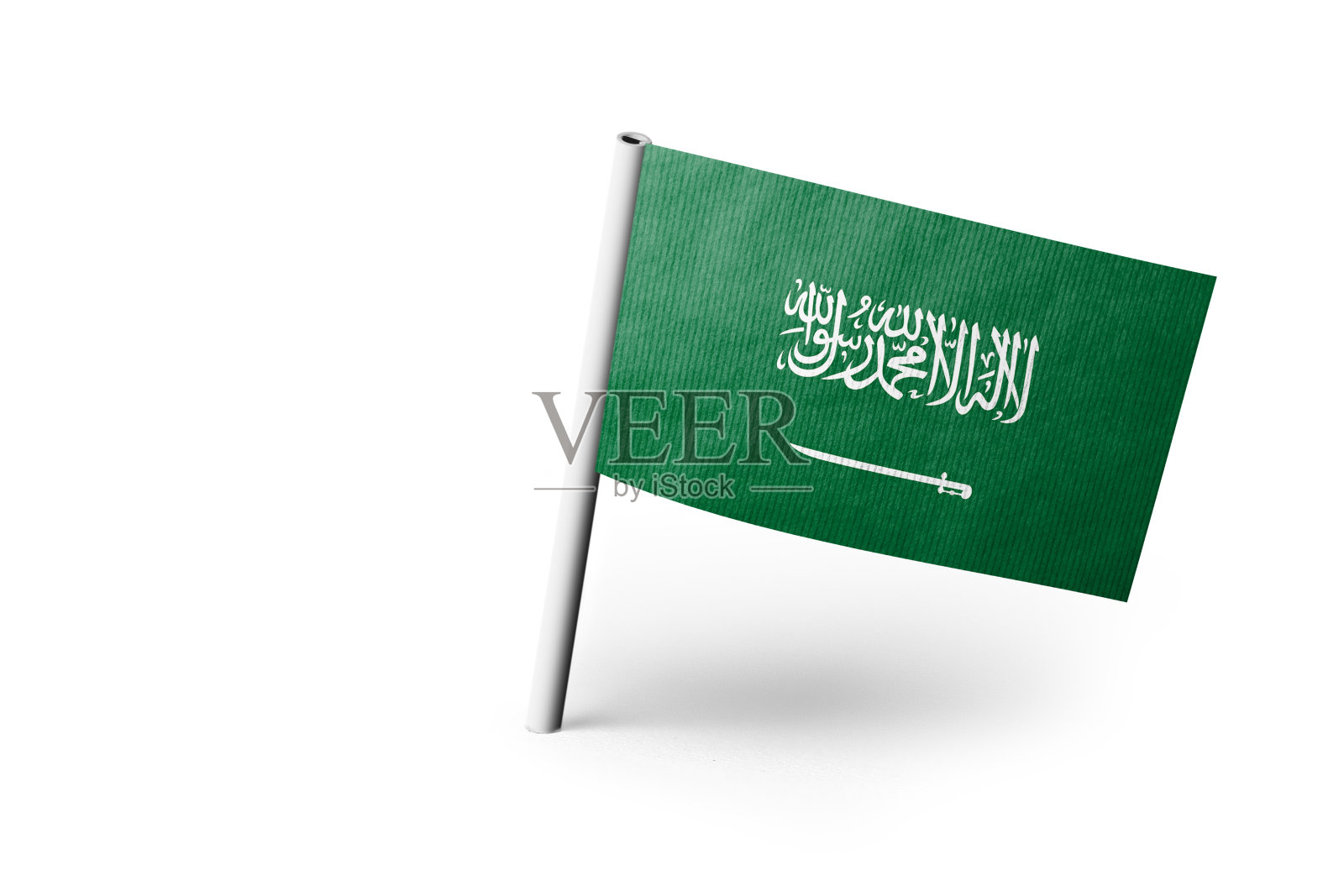 沙特阿拉伯国旗图钉，白色背景照片摄影图片