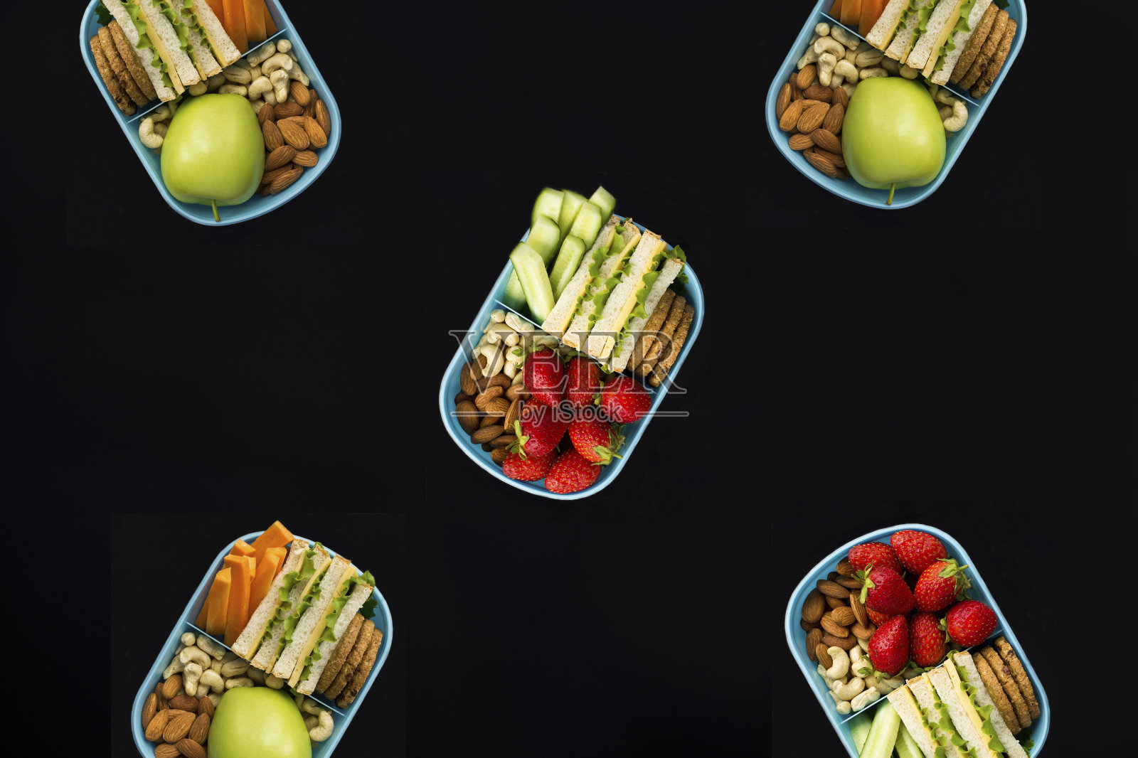 黑色背景上的午餐盒的俯视图。副本的空间。照片摄影图片