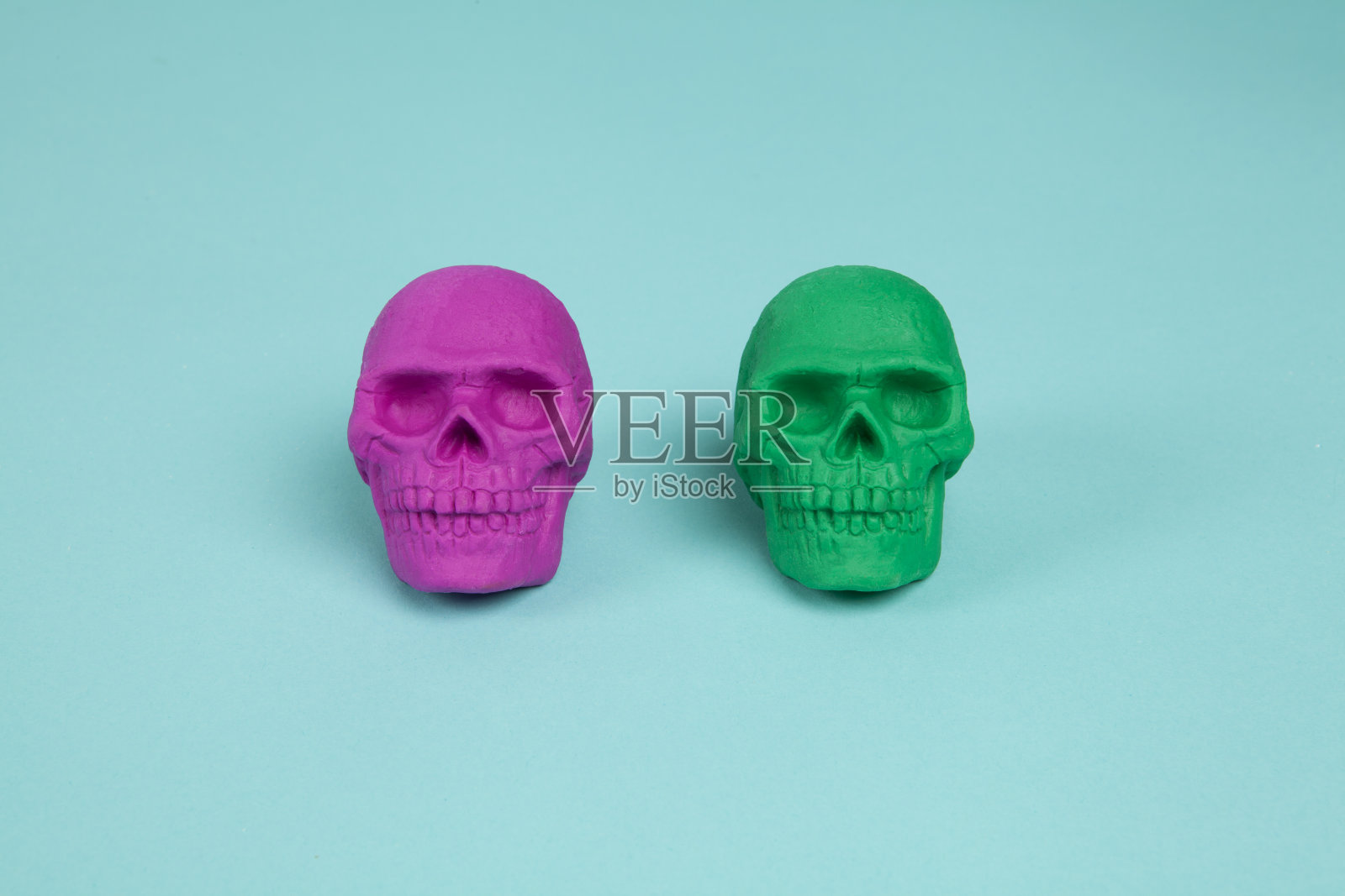 粉色和绿色的头骨照片摄影图片