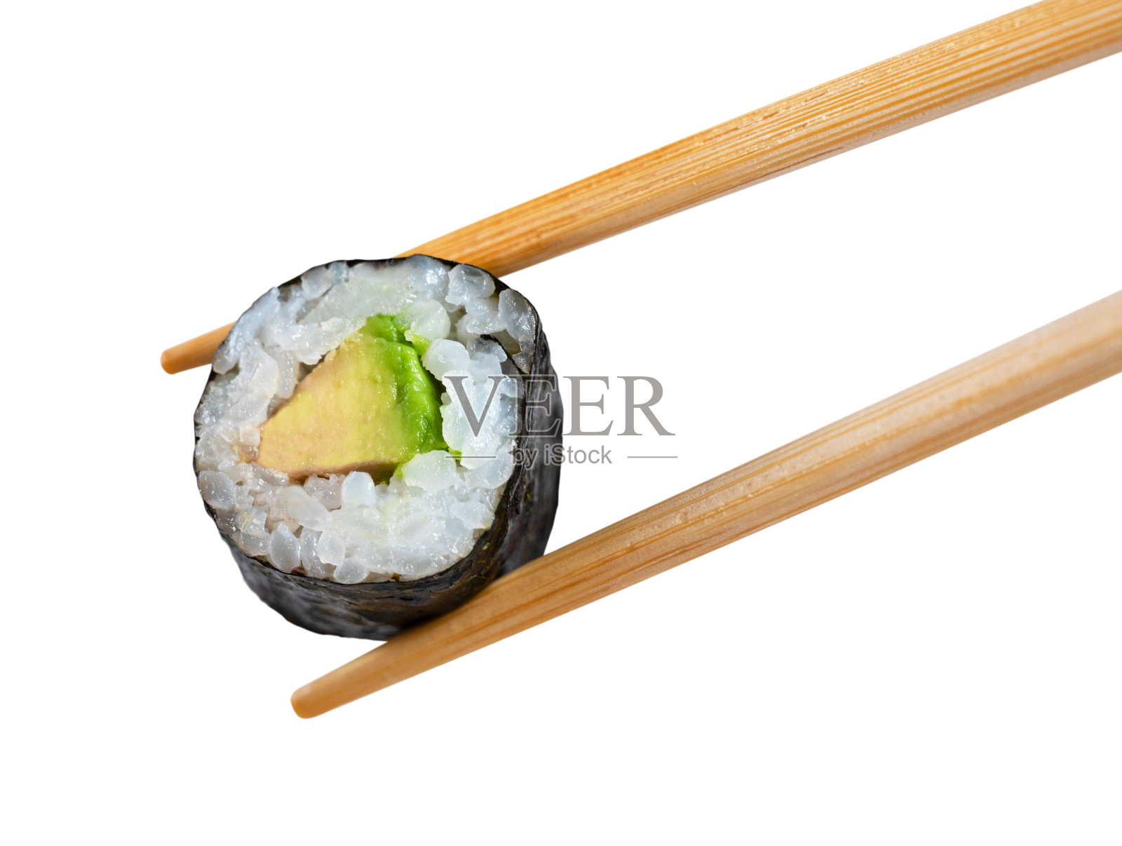 夹着一块寿司的筷子照片摄影图片