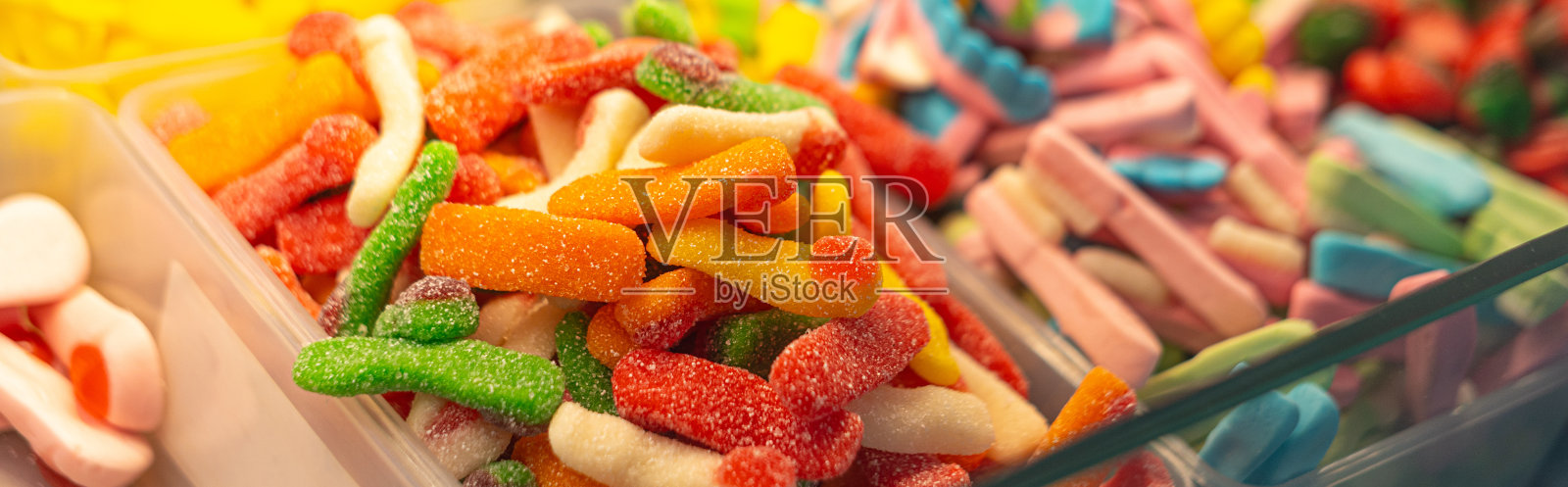 彩色果酱糖。食品的背景照片摄影图片