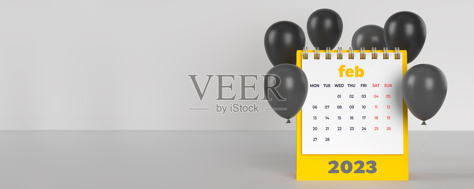 庆祝2023年2月螺旋台历。照片摄影图片