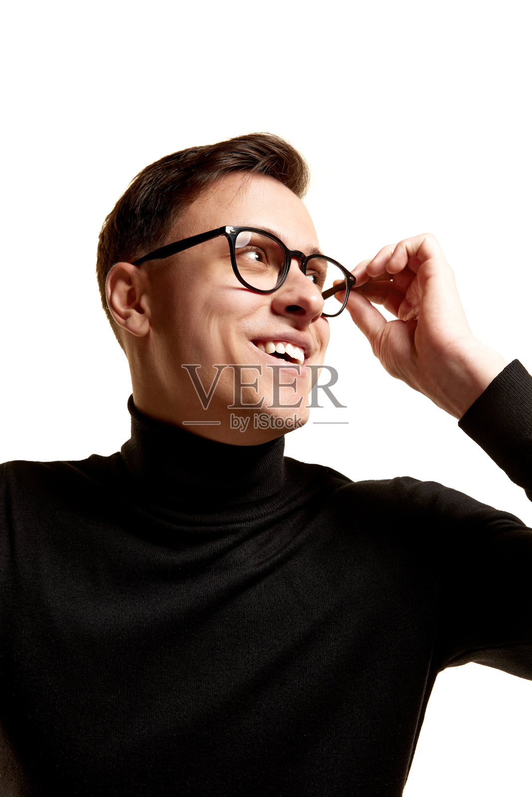 快乐的人。时尚帅气的商人肖像在总黑色装备摆孤立的白色背景。美，时尚，风格和商业的概念照片摄影图片