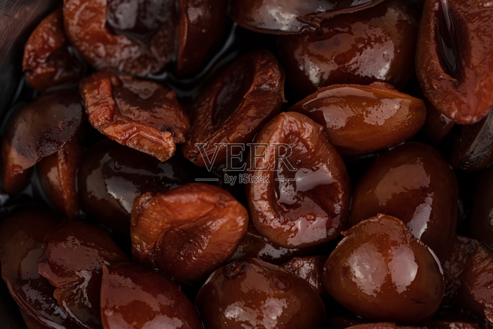 醋里的甜酸梅照片摄影图片