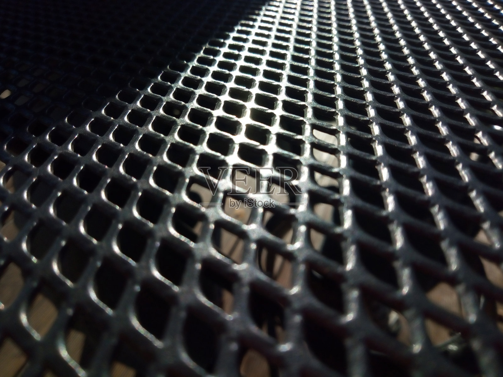 选择性聚焦黑色金属格栅照片摄影图片