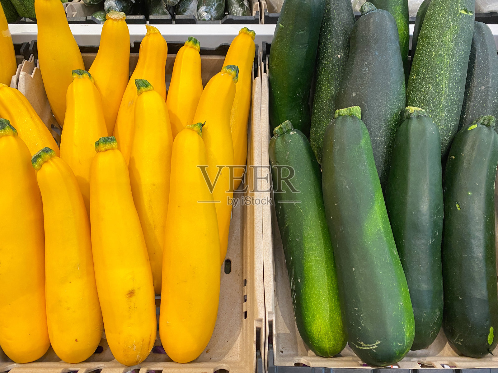 黄色和绿色西葫芦架照片摄影图片