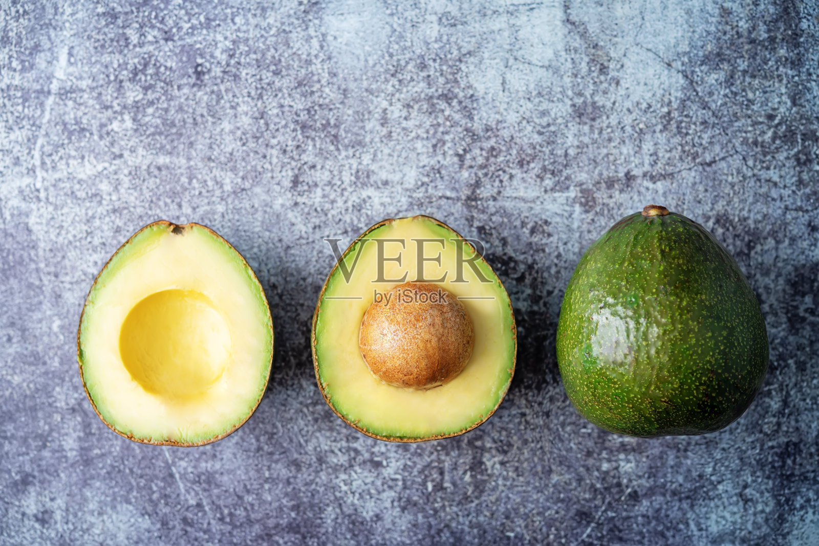 新鲜的绿色牛油果的背景照片摄影图片