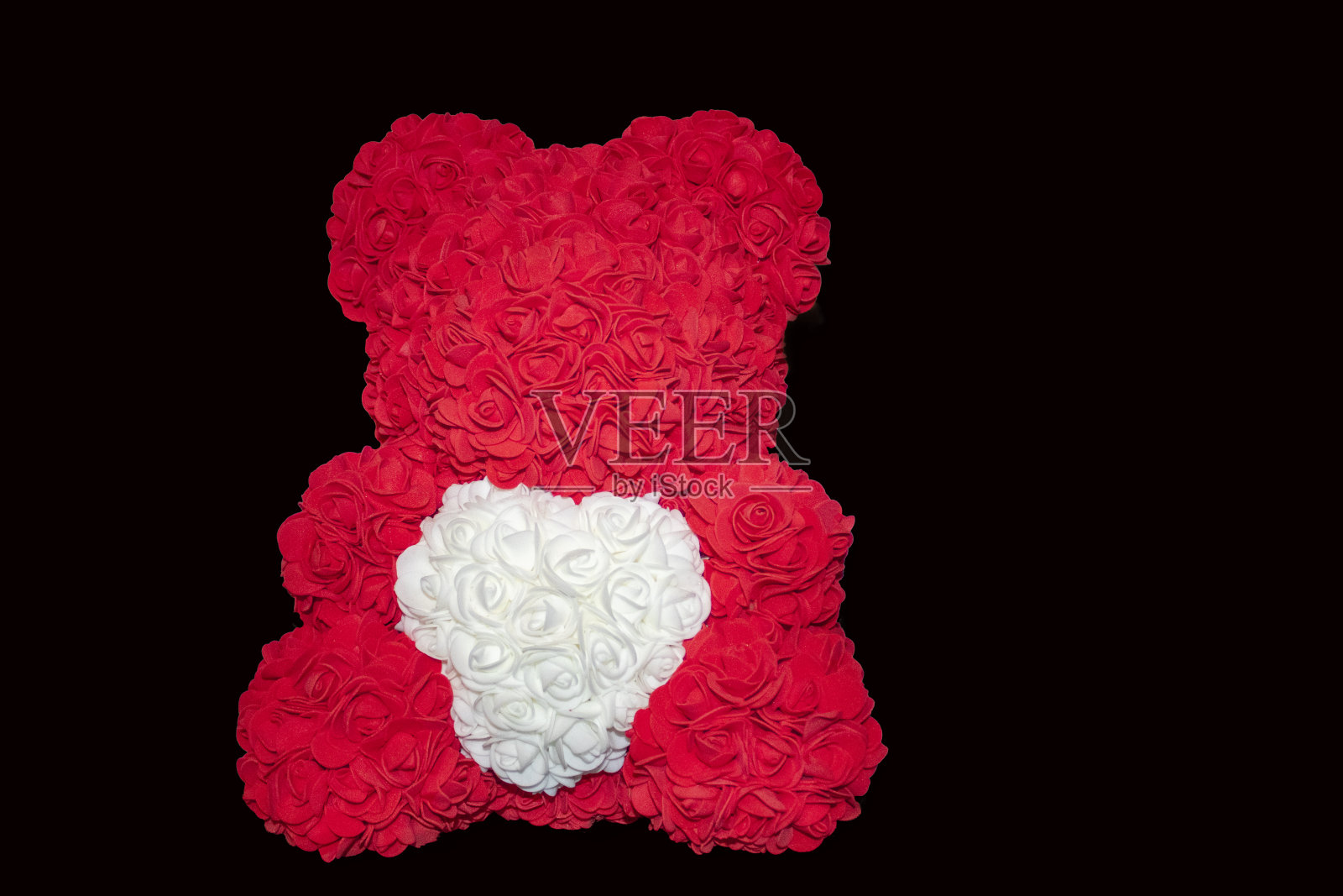 红色的玫瑰熊是情人节或女人生日的礼物照片摄影图片