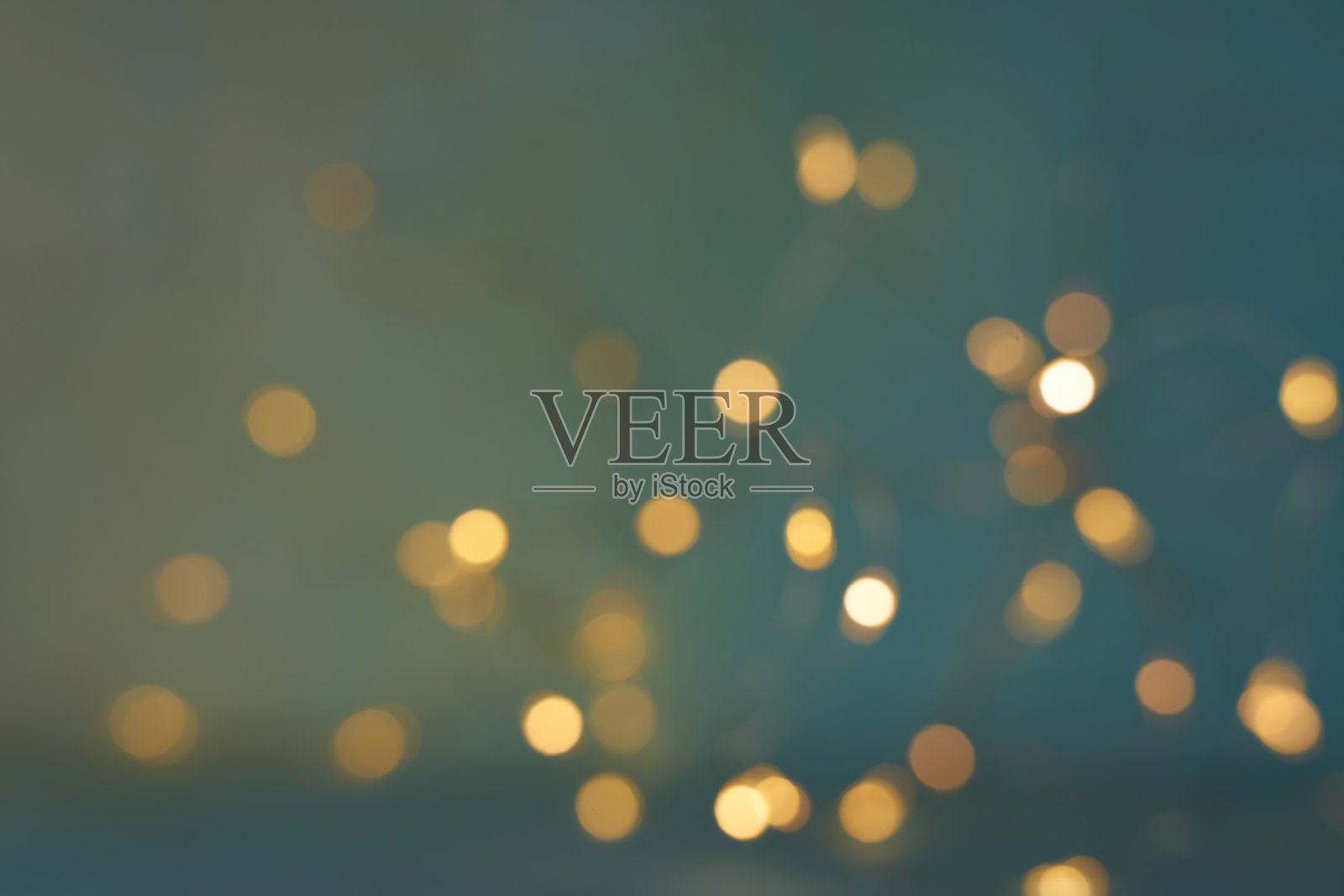 圣诞灯光背景。节日光辉的背景。背景与闪烁的光散焦。模糊的散景。照片摄影图片