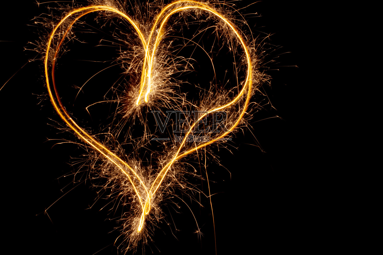 火花之心，用相机慢速快门。照片摄影图片