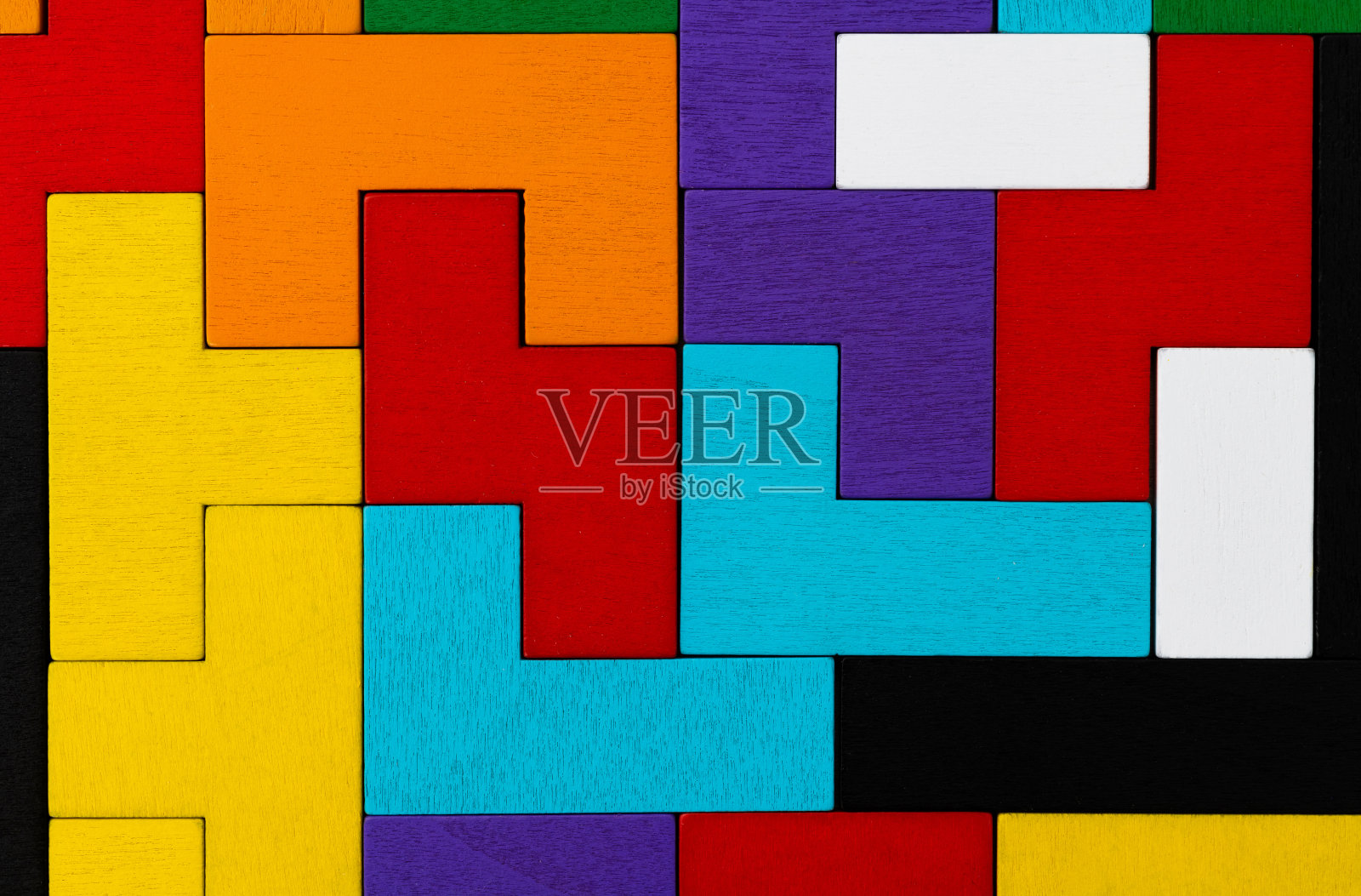 背景是不同颜色形状的木块照片摄影图片