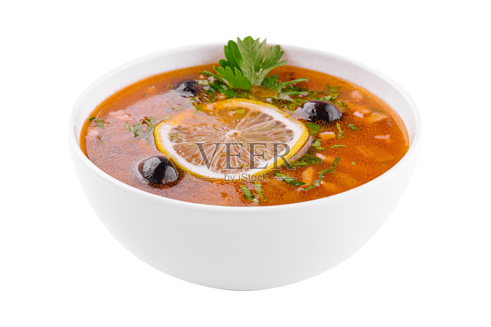 肉汤Solyanka在碗上白色照片摄影图片