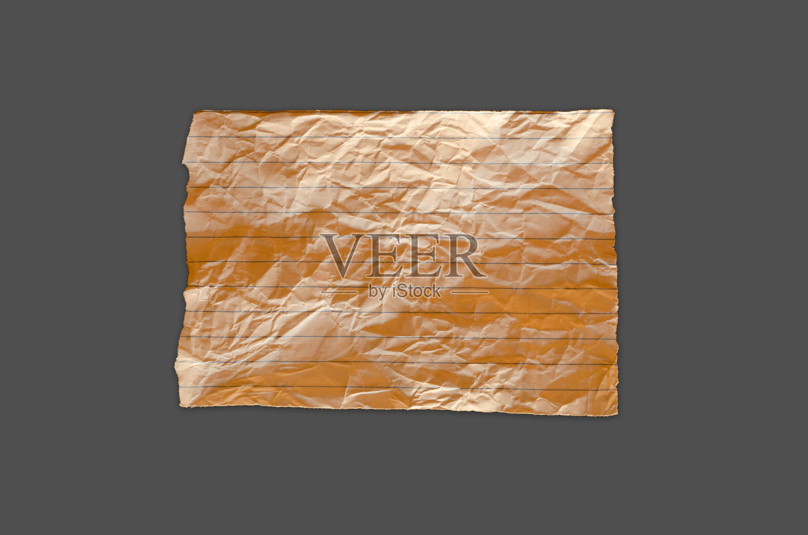 在普通背景上撕破的纸照片摄影图片