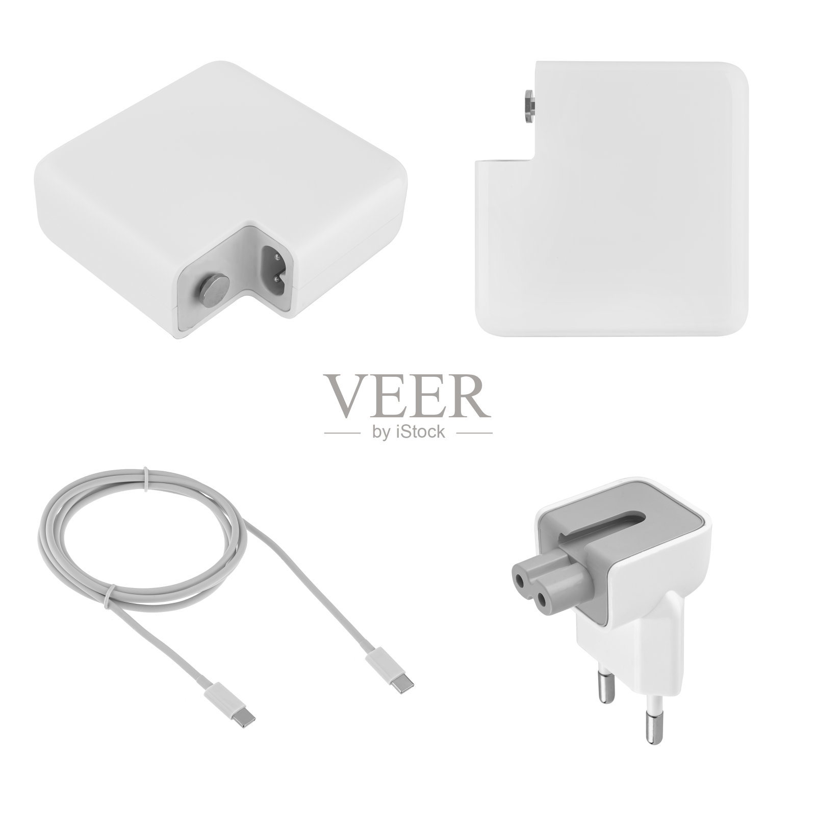 笔记本电源适配器，白色底色照片摄影图片