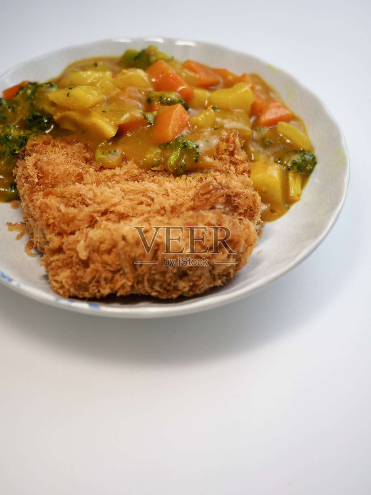 亚洲菜咖喱肉排，烹饪照片摄影图片