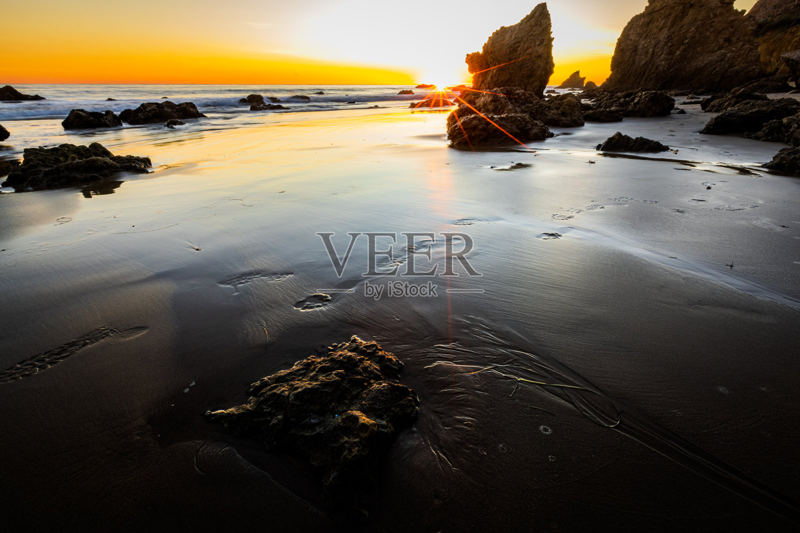 斗牛士星爆到海岸岩照片摄影图片