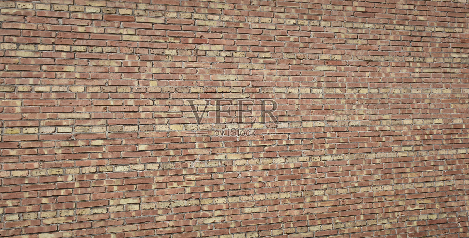 老曲线砖墙为背景。照片摄影图片