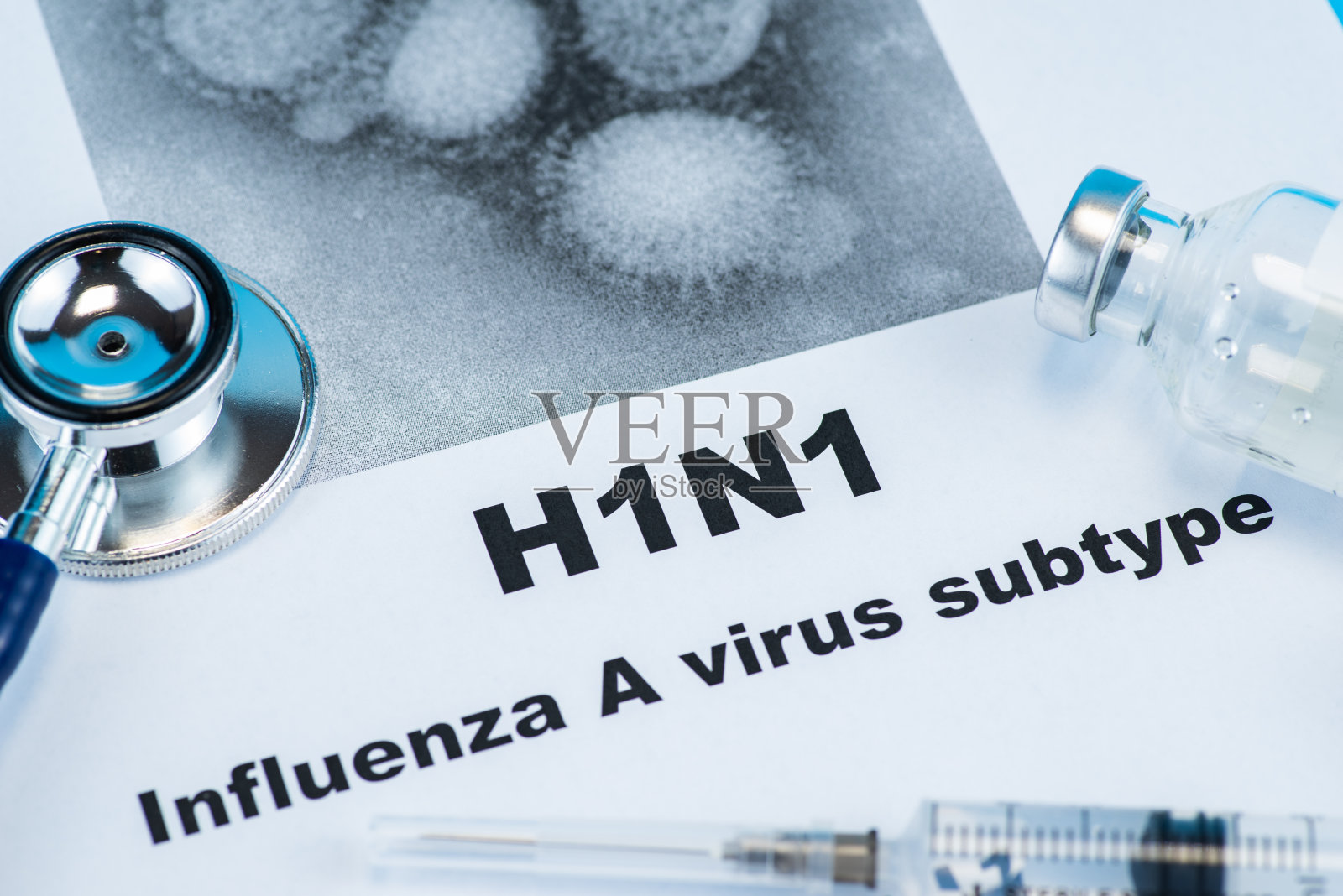 A型流感病毒亚型H1N1字病特写与听诊器，医学健康概念照片摄影图片
