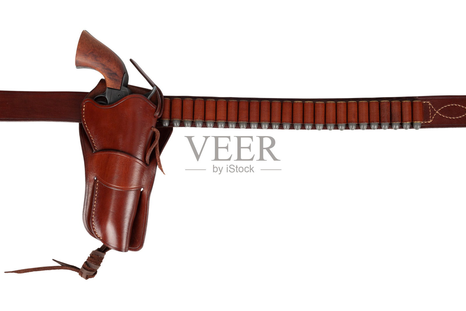 古老的西部武器。皮革枪带弹药和左轮手枪在皮套照片摄影图片